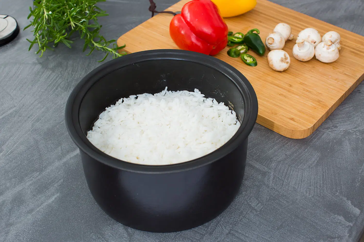 The inner bowls of a rice cooker - GreedyPanda Foodie Blog