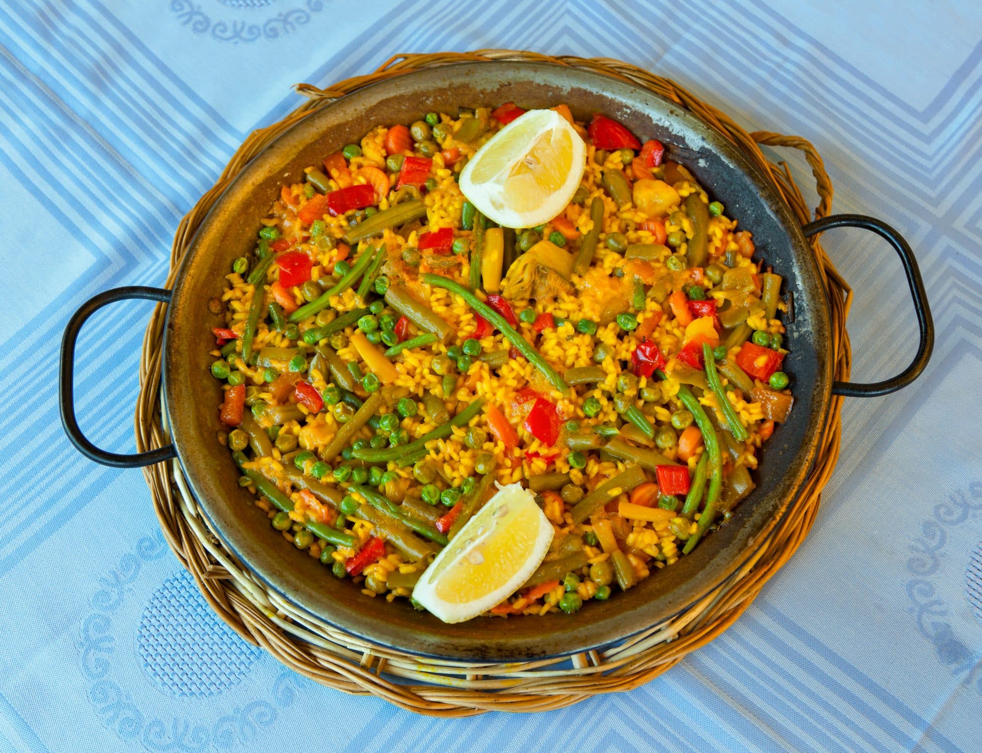 Vegan paella with rice and some vegetables.