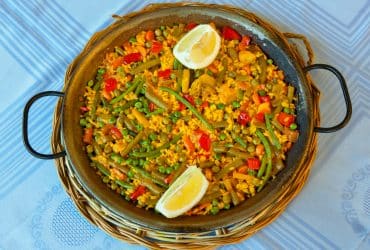 Vegan paella with rice and some vegetables.