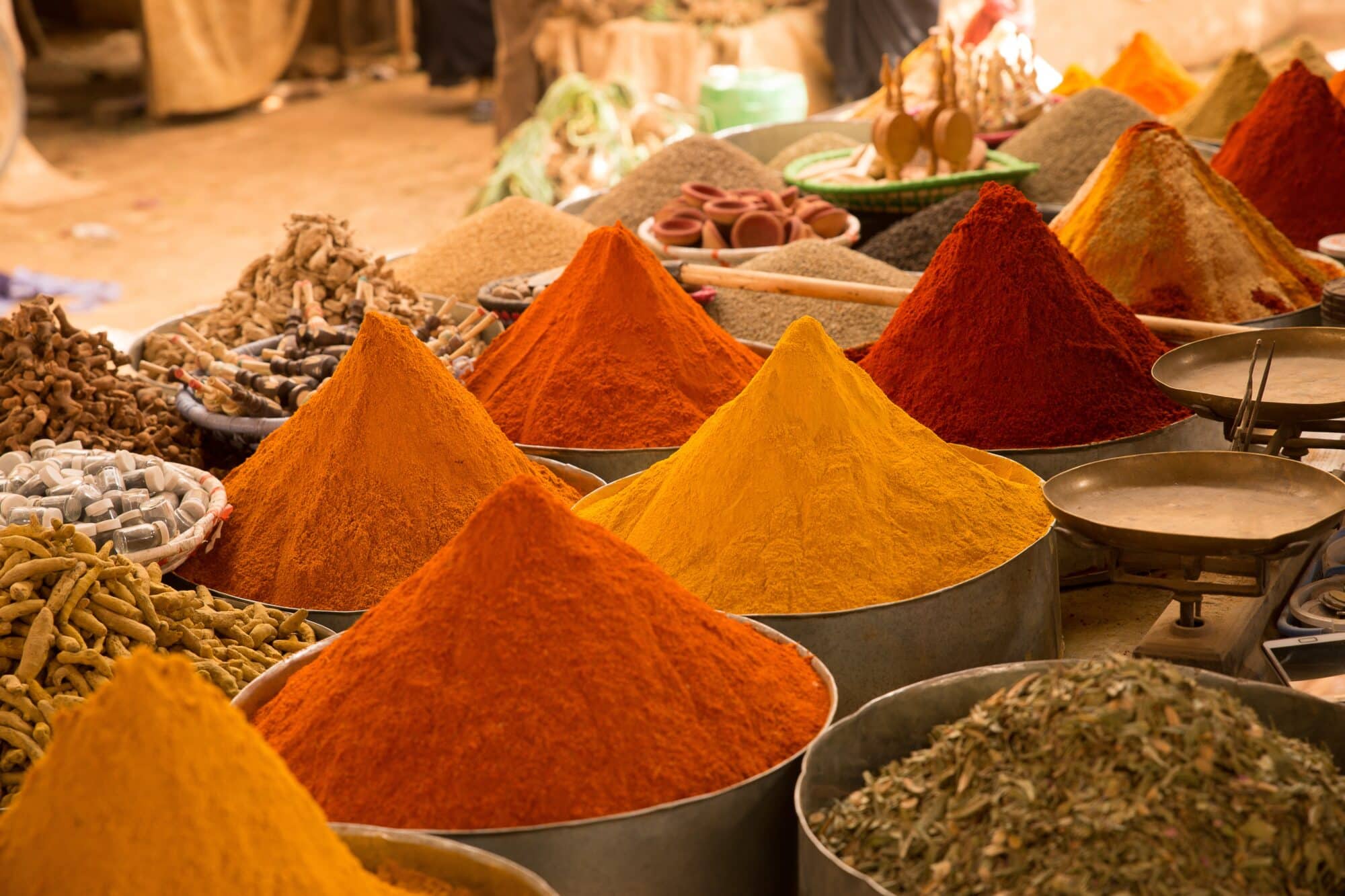A closeup shot of colorful Asian spices in the market with a blurry background