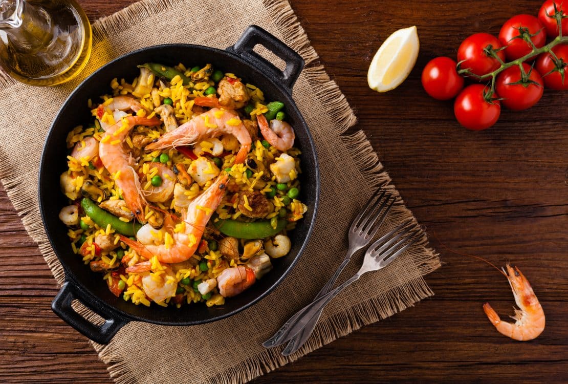 Traditional Spanish paella with seafood and chicken.